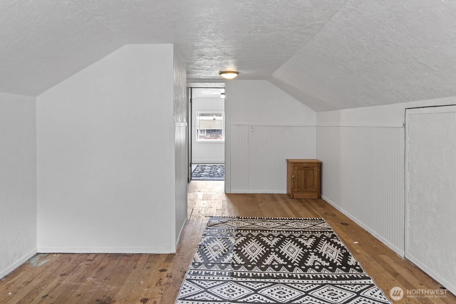 325 3rd Street Morton, WA 98356 - Photo 23 of 40 a view of an empty room and window