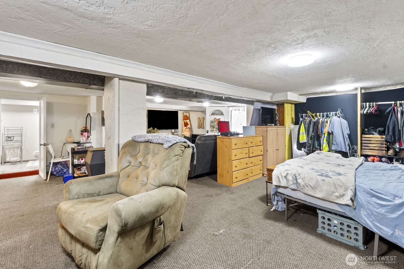 325 3rd Street Morton, WA 98356 - Photo 31 of 40 a living room with furniture and a flat screen tv