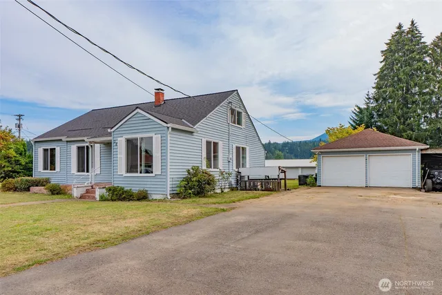 a view of garage and yard