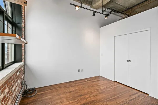 a view of entryway with wooden floor