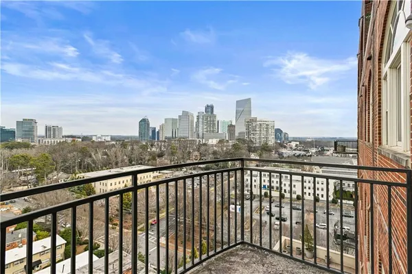 a view of a balcony with city view