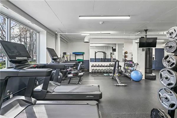 a view of a pathway of a house with a yard