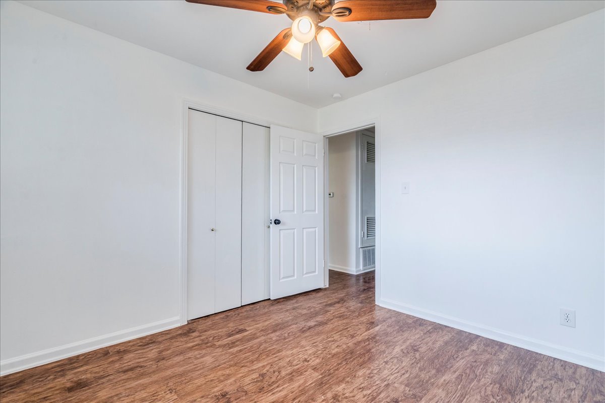 1417 Braes Ridge Drive, Unit B Austin, TX 78723 - Photo 8 of 22 a view of an empty room and chandelier fan