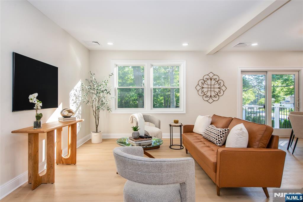 145 Grove Street Mahwah, NJ 07430 - Photo 3 of 30 a living room with furniture and a large window
