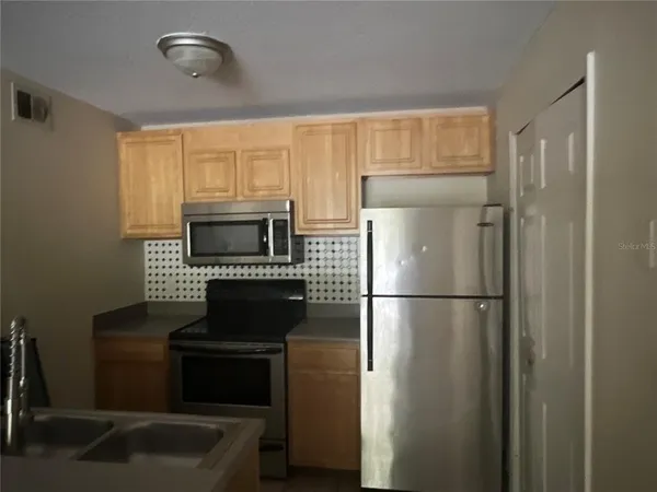$1,395 | 8939 Latrec Avenue, Unit 1205, Orlando, FL 32819