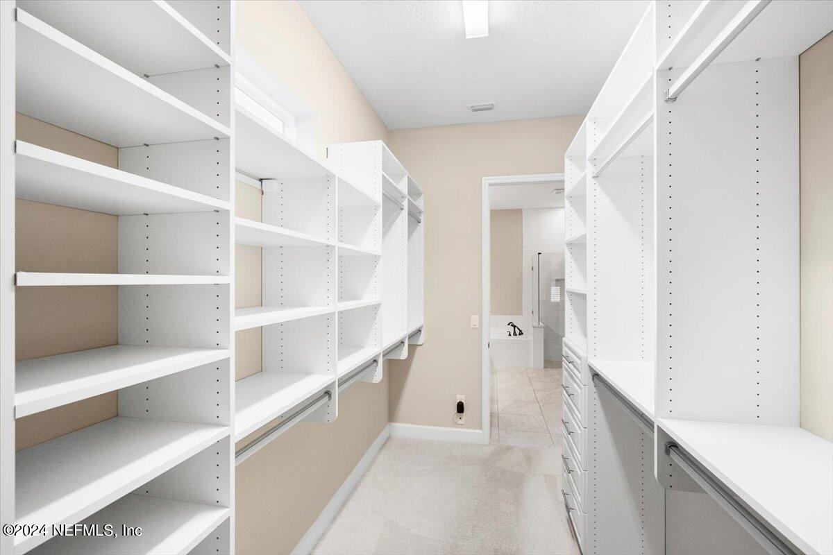 2566 Riley Oaks Trail Jacksonville, FL 32223 - Photo 33 of 47 Primary Closet w/Custom Shelvin