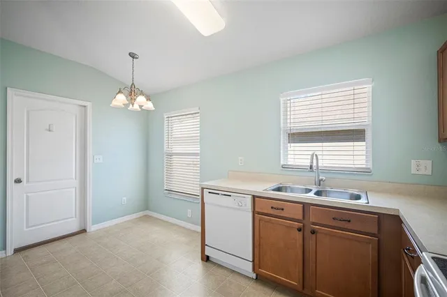 a room with a sink and a window