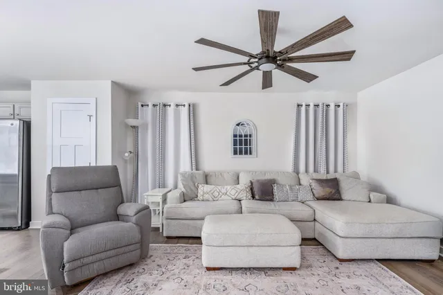 a living room with furniture and a couch