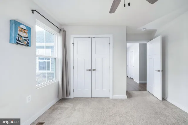 a view of balcony with wooden floor