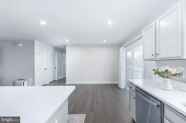 a view of a balcony with lake view and wooden floor