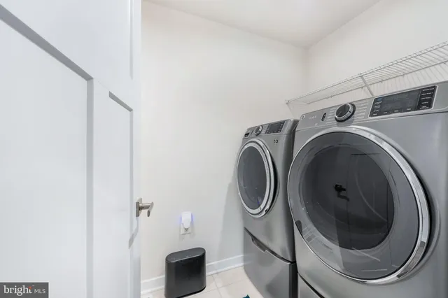 a view of house with a yard