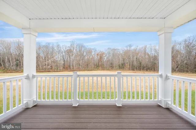 an aerial view of city lake and houses with outdoor space