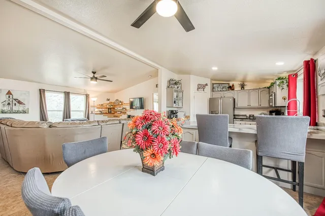 a bedroom with a bed and a desk