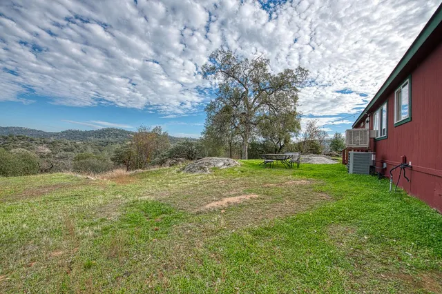 a house view with a garden space