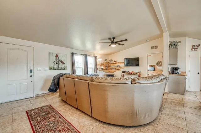 a living room with a couch and a table