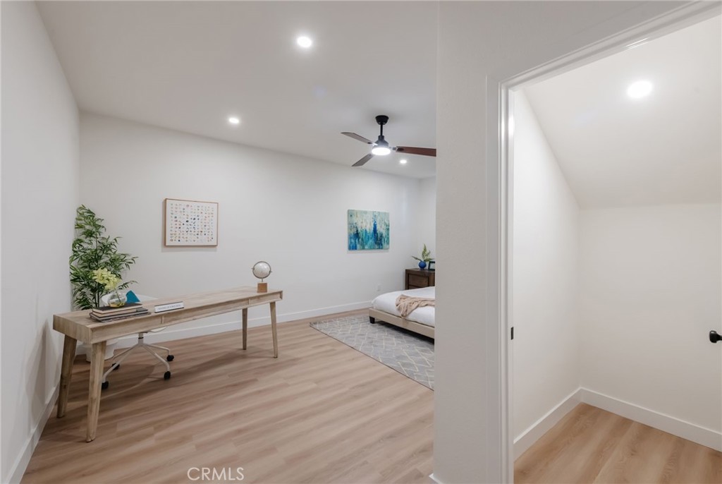 1044 252nd Street, Unit 4 Harbor City, CA 90710 - Photo 11 of 41 a living room with furniture and a wooden floor