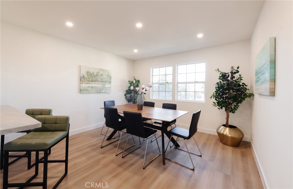 1044 252nd Street, Unit 4 Harbor City, CA 90710 - Photo 12 of 41 a view of a dining room with furniture and window