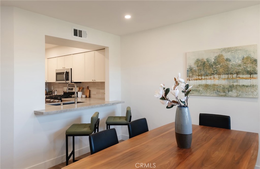 1044 252nd Street, Unit 4 Harbor City, CA 90710 - Photo 13 of 41 a living room with furniture