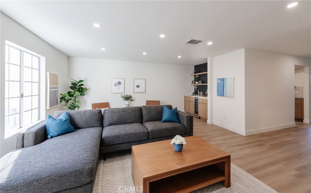 1044 252nd Street, Unit 4 Harbor City, CA 90710 - Photo 25 of 41 a living room with furniture and a window