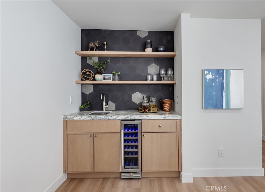 1044 252nd Street, Unit 4 Harbor City, CA 90710 - Photo 26 of 41 a kitchen with a stove and cabinets