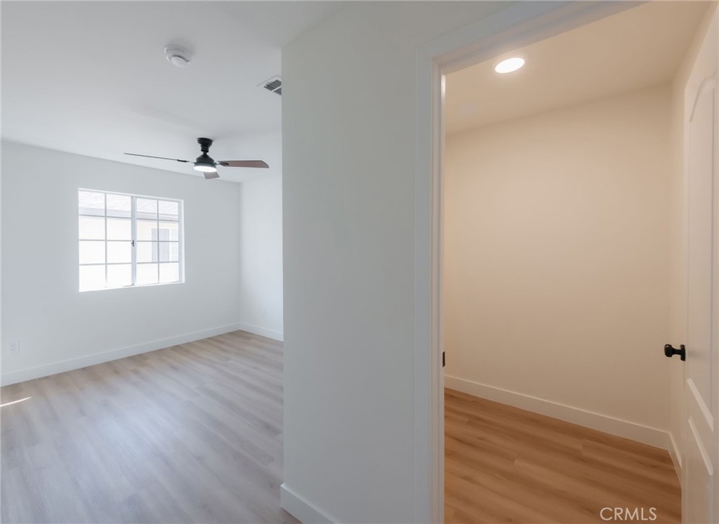 1044 252nd Street, Unit 4 Harbor City, CA 90710 - Photo 35 of 41 wooden floor in an empty room with a window