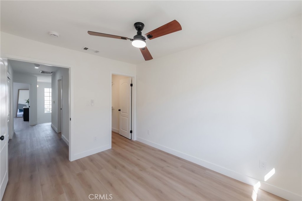 1044 252nd Street, Unit 4 Harbor City, CA 90710 - Photo 9 of 41 a view of a livingroom with wooden floor