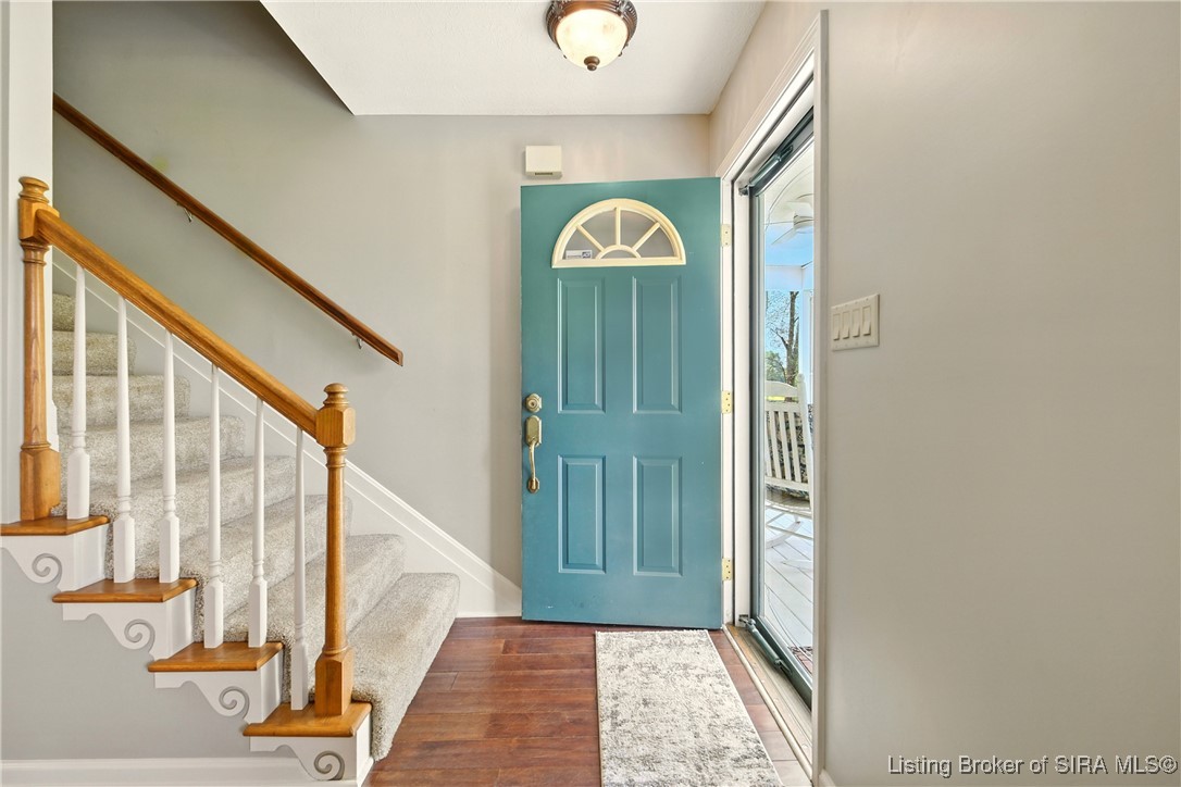 6618 Buttontown Road Greenville, IN 47124 - Photo 21 of 35 Livingroom with entrance and stairs to second floor bedrooms and bathroom