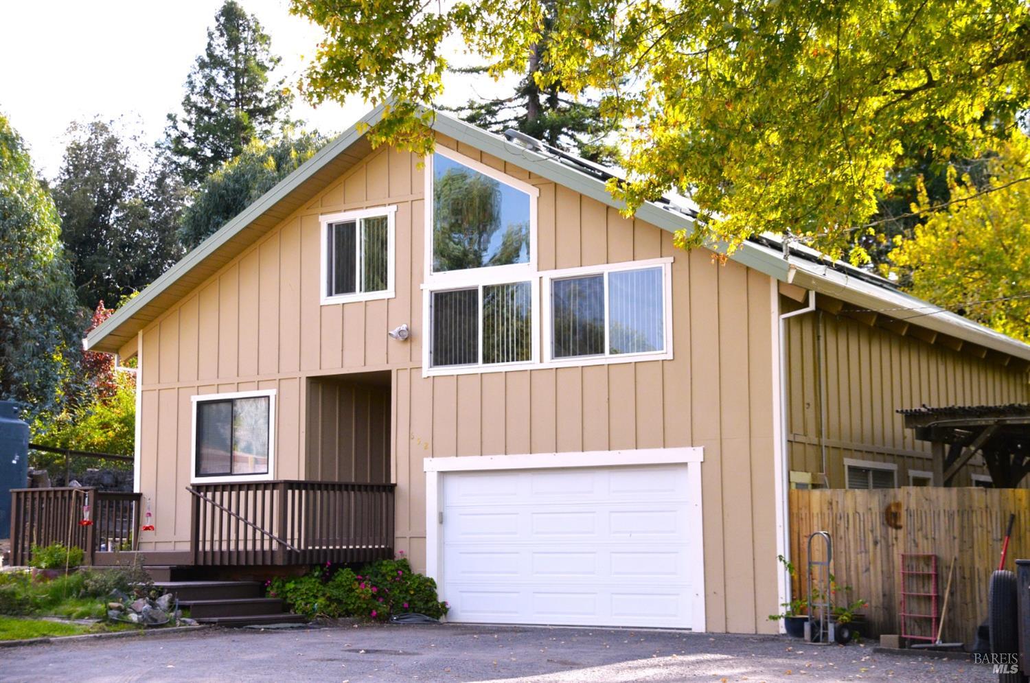 652 Red Tail Road Healdsburg, CA 95448 - Photo 1 of 1 Front of Home. One of the Water Storage tanks is shown to the left.