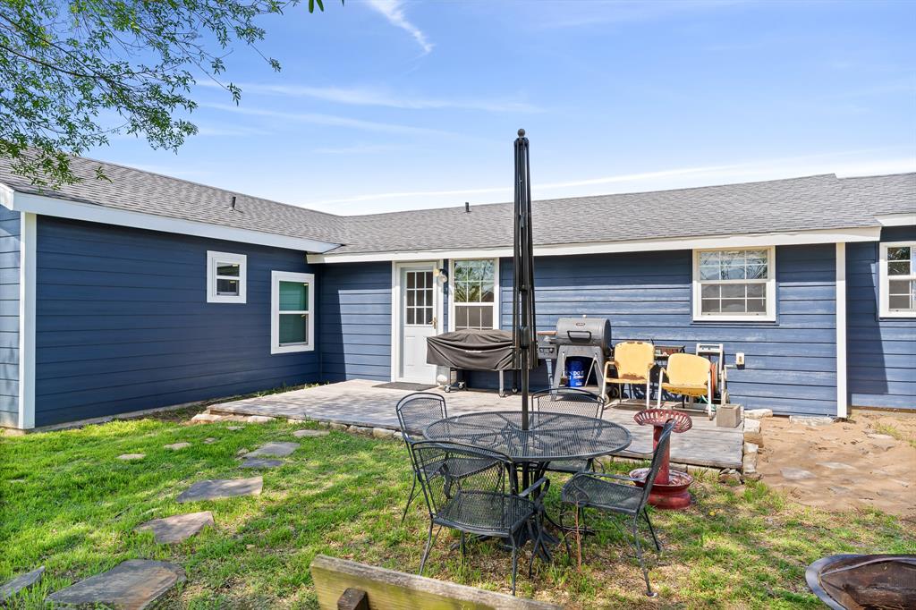 108 Paige Street Weatherford, TX 76088 - Photo 28 of 34 a house view with outdoor seating space