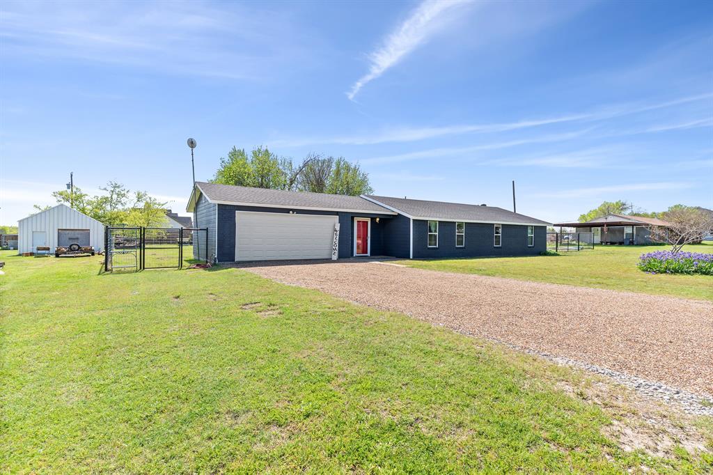 108 Paige Street Weatherford, TX 76088 - Photo 33 of 34 a front view of a house with a yard