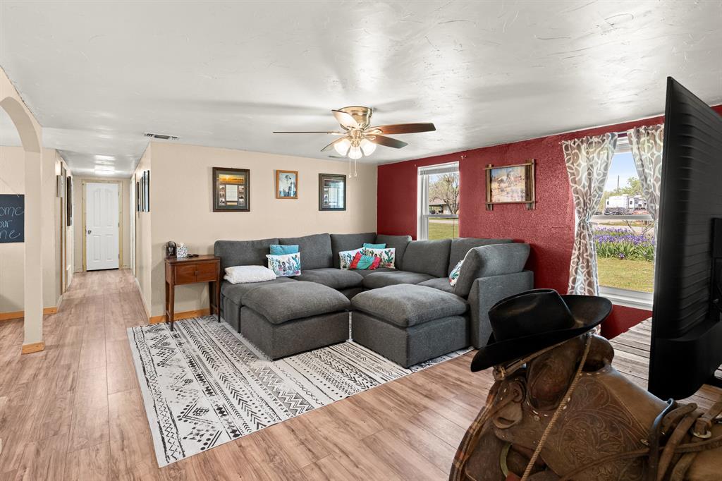 108 Paige Street Weatherford, TX 76088 - Photo 8 of 34 a living room with furniture and a window