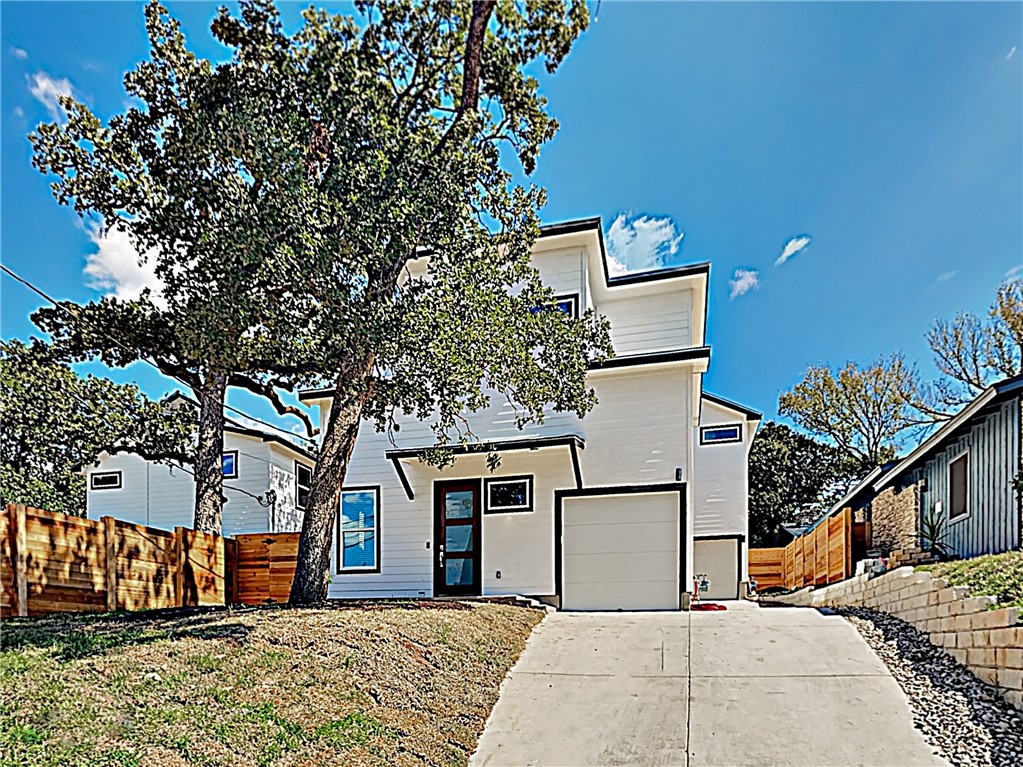 5314 Downs Drive, Unit A Austin, TX 78721 - Photo 2 of 19 a view of a outdoor space with a tree