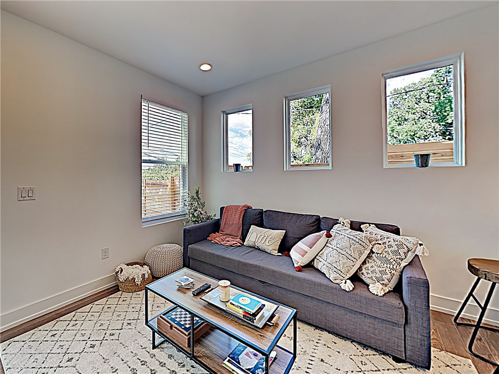 5314 Downs Drive, Unit A Austin, TX 78721 - Photo 4 of 19 a living room with furniture and a window