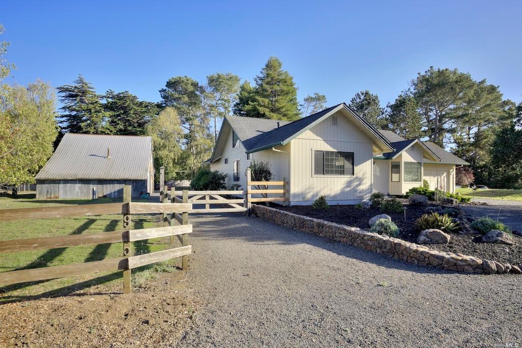 95 Cherry Tree Lane Point Reyes Station, CA 94956 - Photo 1 of 1 a front view of a house with garden
