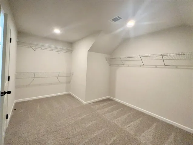 a view of a room with racks on the wall