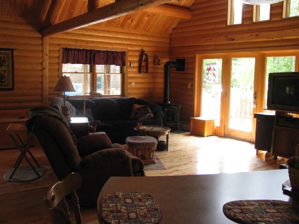 35 Harvey Road Lakeville, ME 04487 - Photo 7 of 35 The living room has access to the...