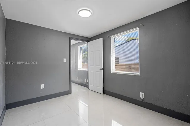 an empty room with windows