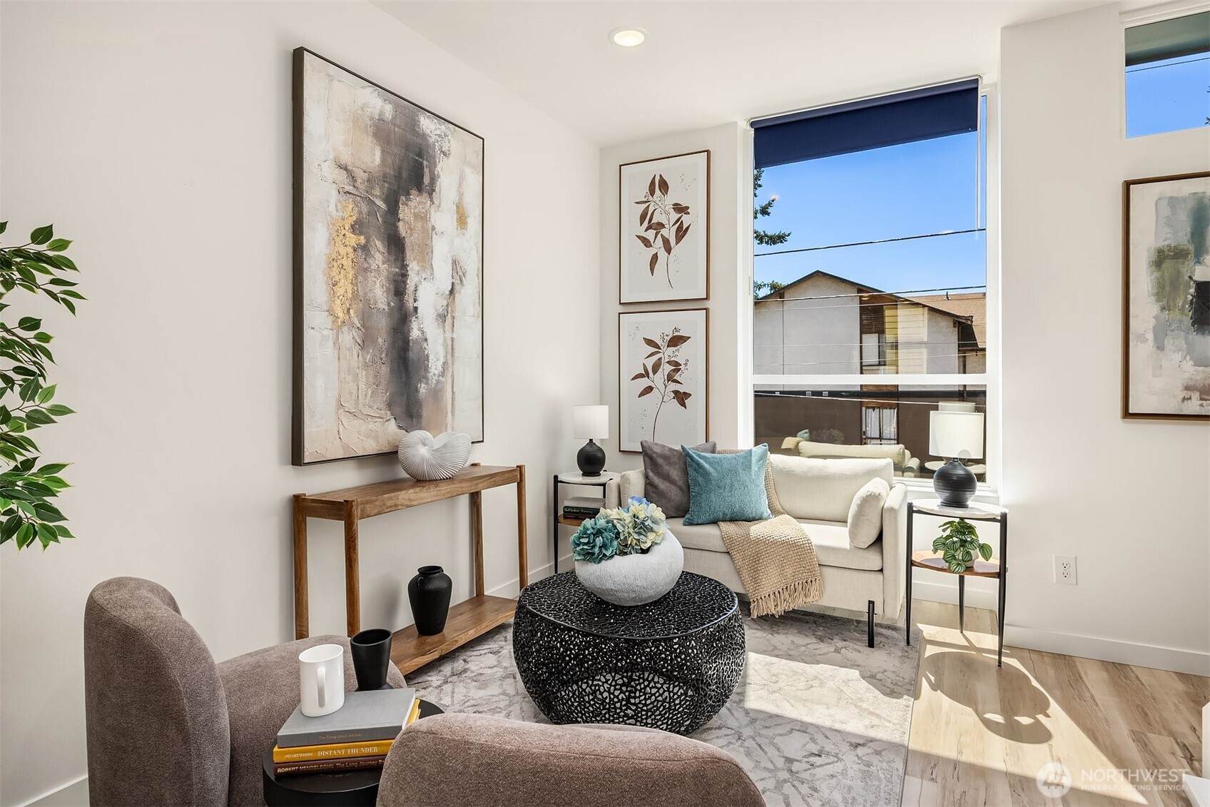 1402 North 95th Street Seattle, WA 98103 - Photo 13 of 31 a living room with furniture and a painting on the wall
