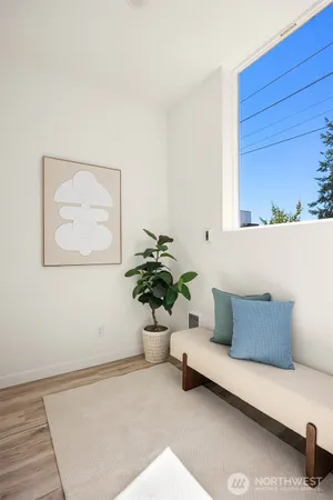 a white bench sitting in a living room
