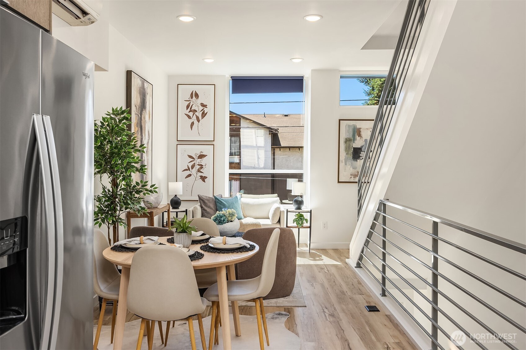 1402 North 95th Street Seattle, WA 98103 - Photo 8 of 31 a view of a dining room with furniture window and wooden floor