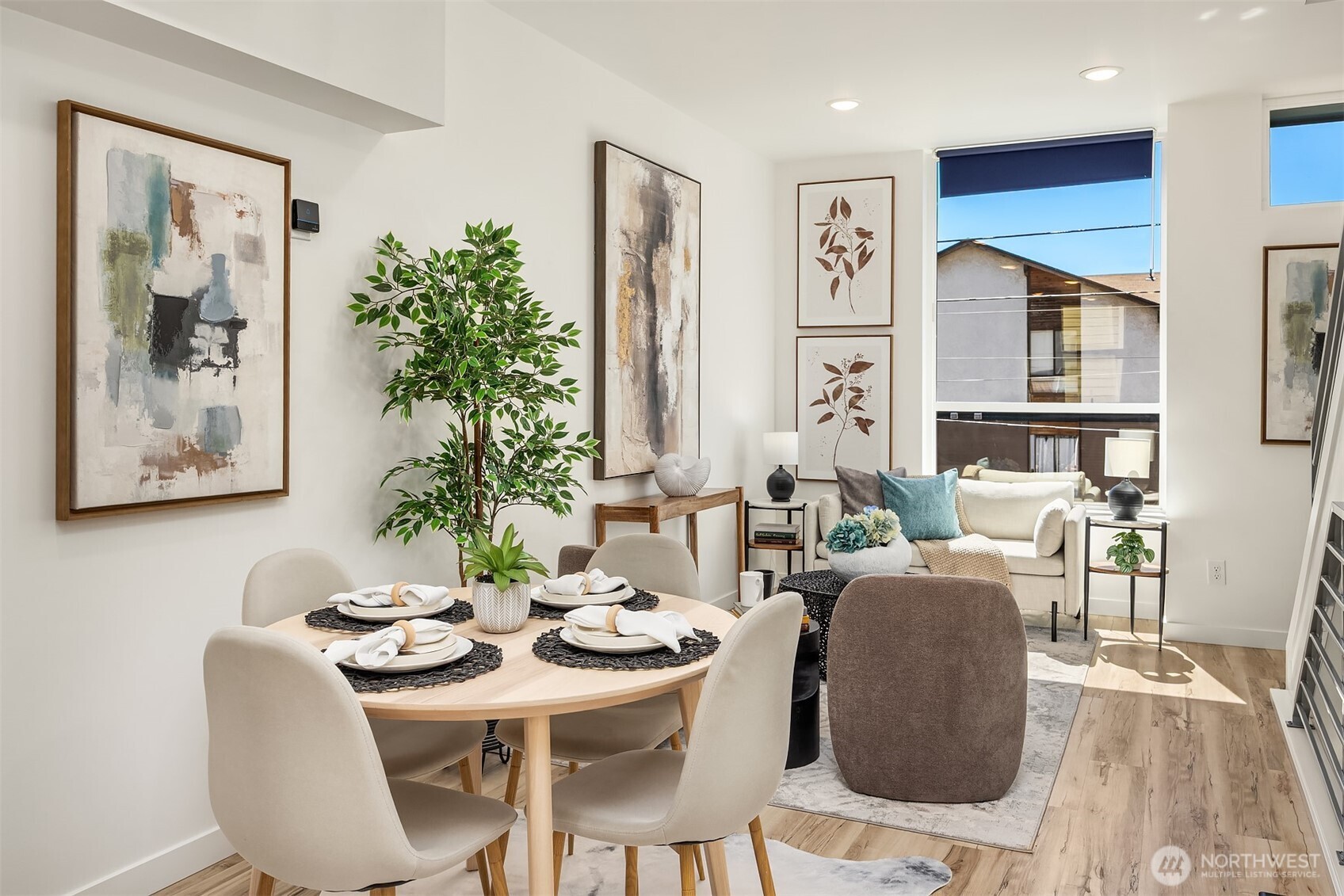 1402 North 95th Street Seattle, WA 98103 - Photo 10 of 31 a view of a dining room with furniture window and wooden floor