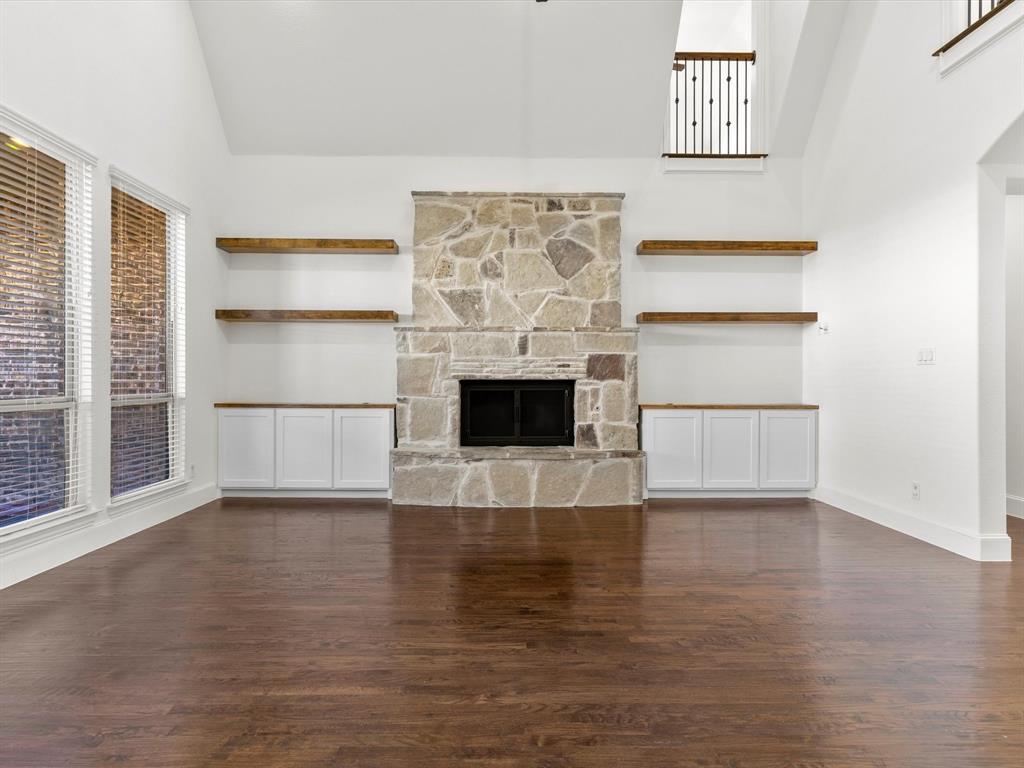 13192 Mapleton Drive Frisco, TX 75035 - Photo 14 of 40 a view of a livingroom with wooden floor