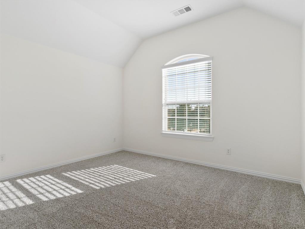 13192 Mapleton Drive Frisco, TX 75035 - Photo 24 of 40 an empty room with a window