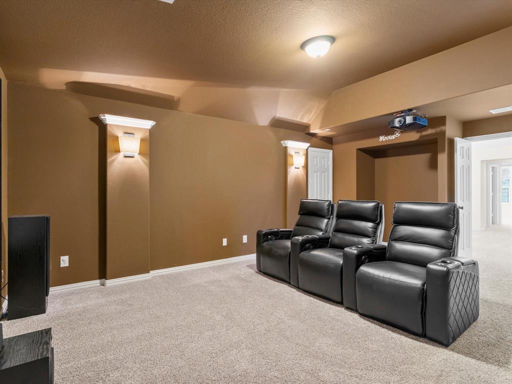 13192 Mapleton Drive Frisco, TX 75035 - Photo 29 of 40 a living room with furniture and a ceiling fan
