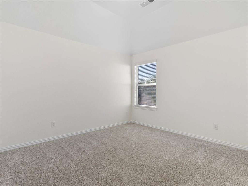 13192 Mapleton Drive Frisco, TX 75035 - Photo 30 of 40 an empty room with a window