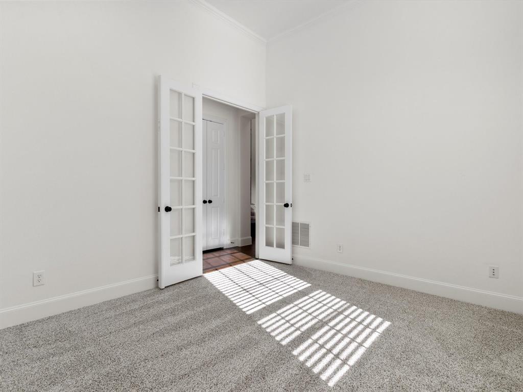 13192 Mapleton Drive Frisco, TX 75035 - Photo 5 of 40 a bedroom with a bed and a window