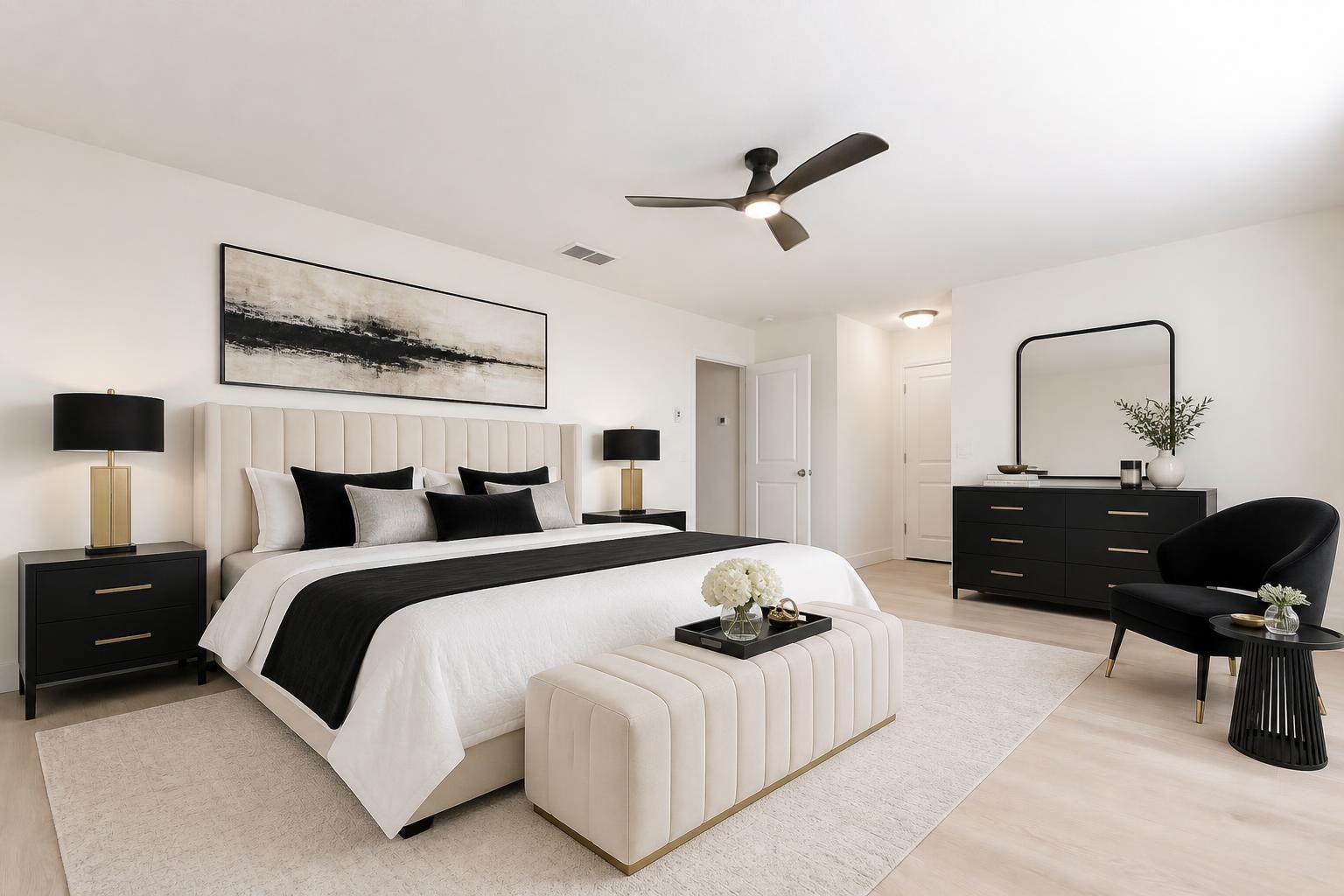 331 Seneca Loop Kyle, TX 78640 - Photo 10 of 29 The primary suite is shown as a serene retreat, with ample room for a king bed, dresser and sitting area.Virtually staged.