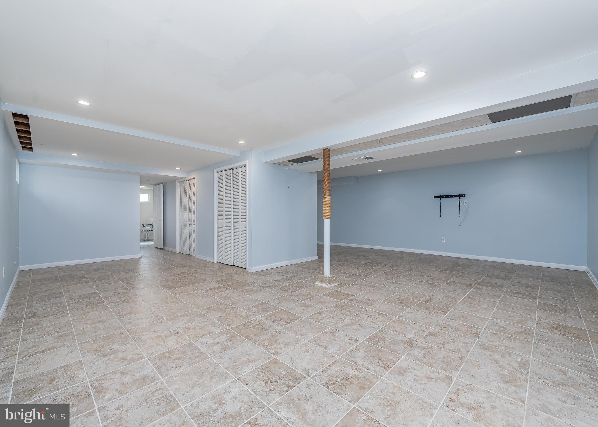 7029 Long View Road Columbia, MD 21044 - Photo 23 of 42 Lower level new ceramic flooring