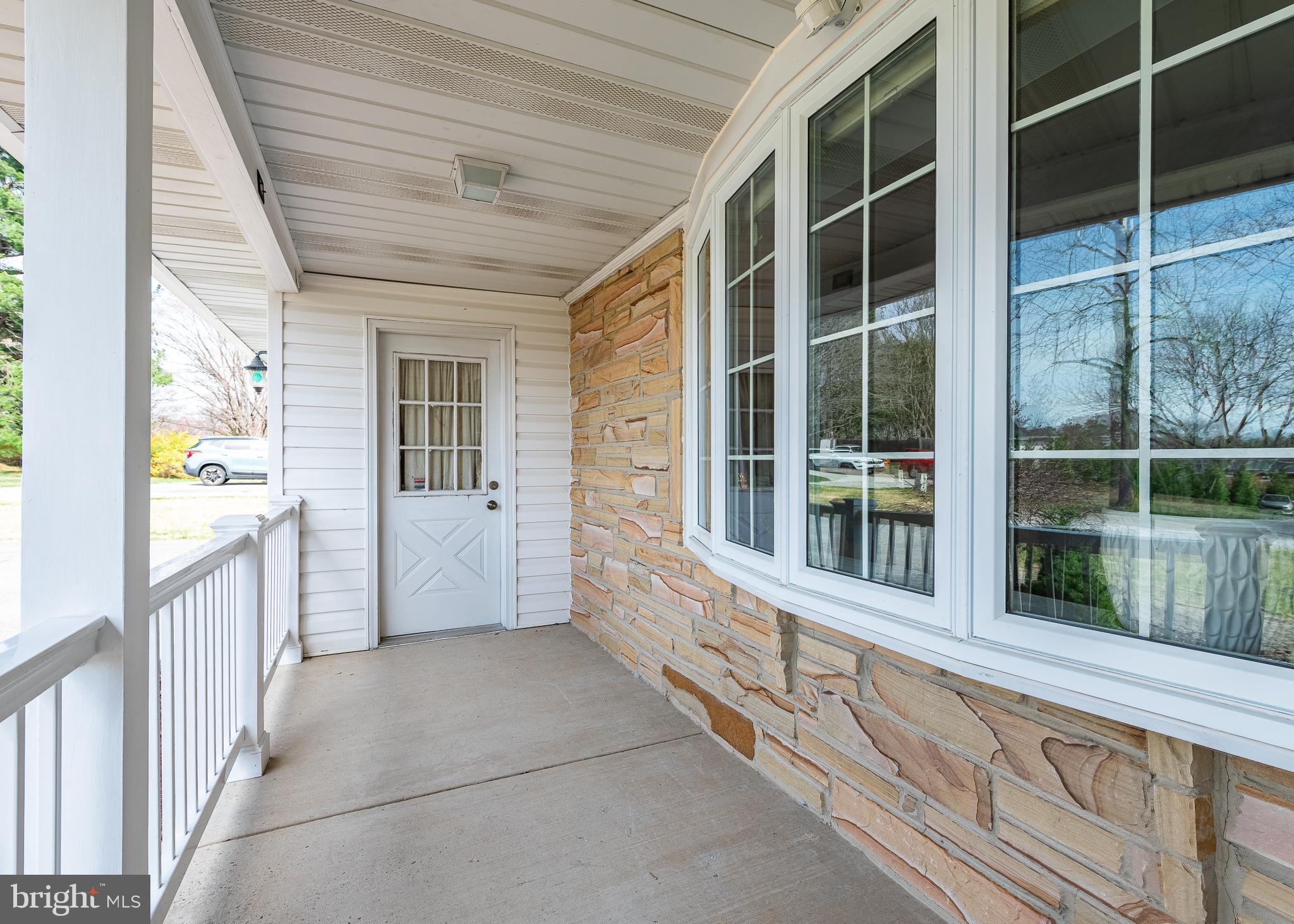 7029 Long View Road Columbia, MD 21044 - Photo 27 of 42 Front porch with add' access to garage l