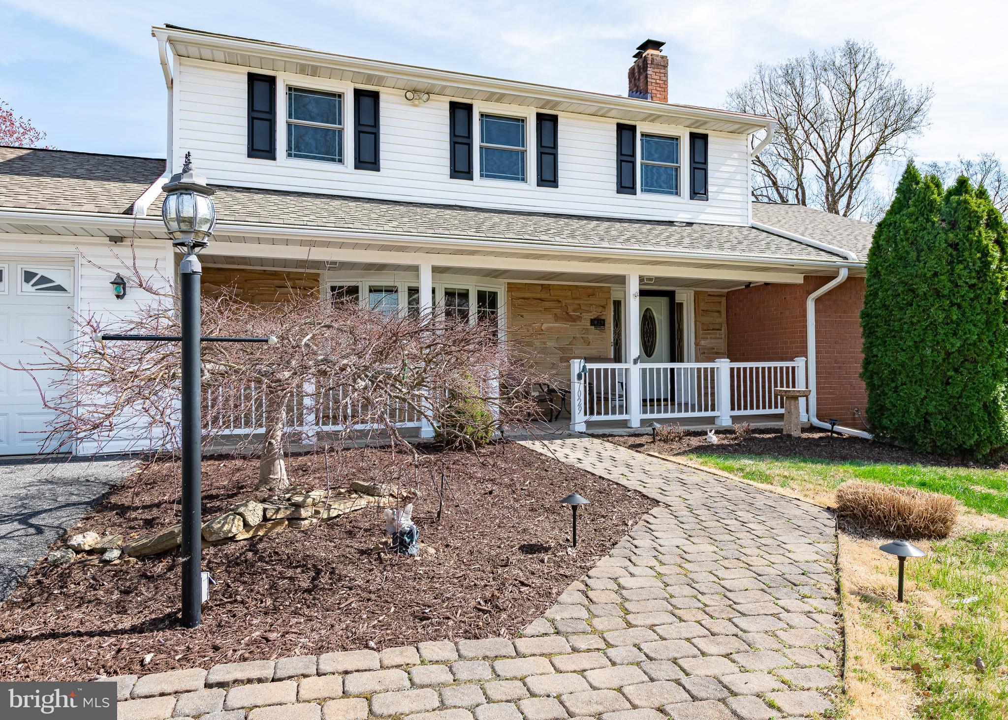 7029 Long View Road Columbia, MD 21044 - Photo 37 of 42 Inviting pavers lead the way